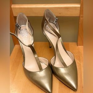 Vince Camuto light bronze patent pointed-toed heels with a t-strap design